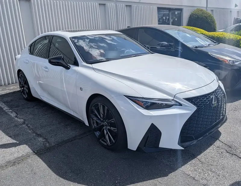 The same 2024 Lexus IS 350 F SPORT after repair, seen from the right front